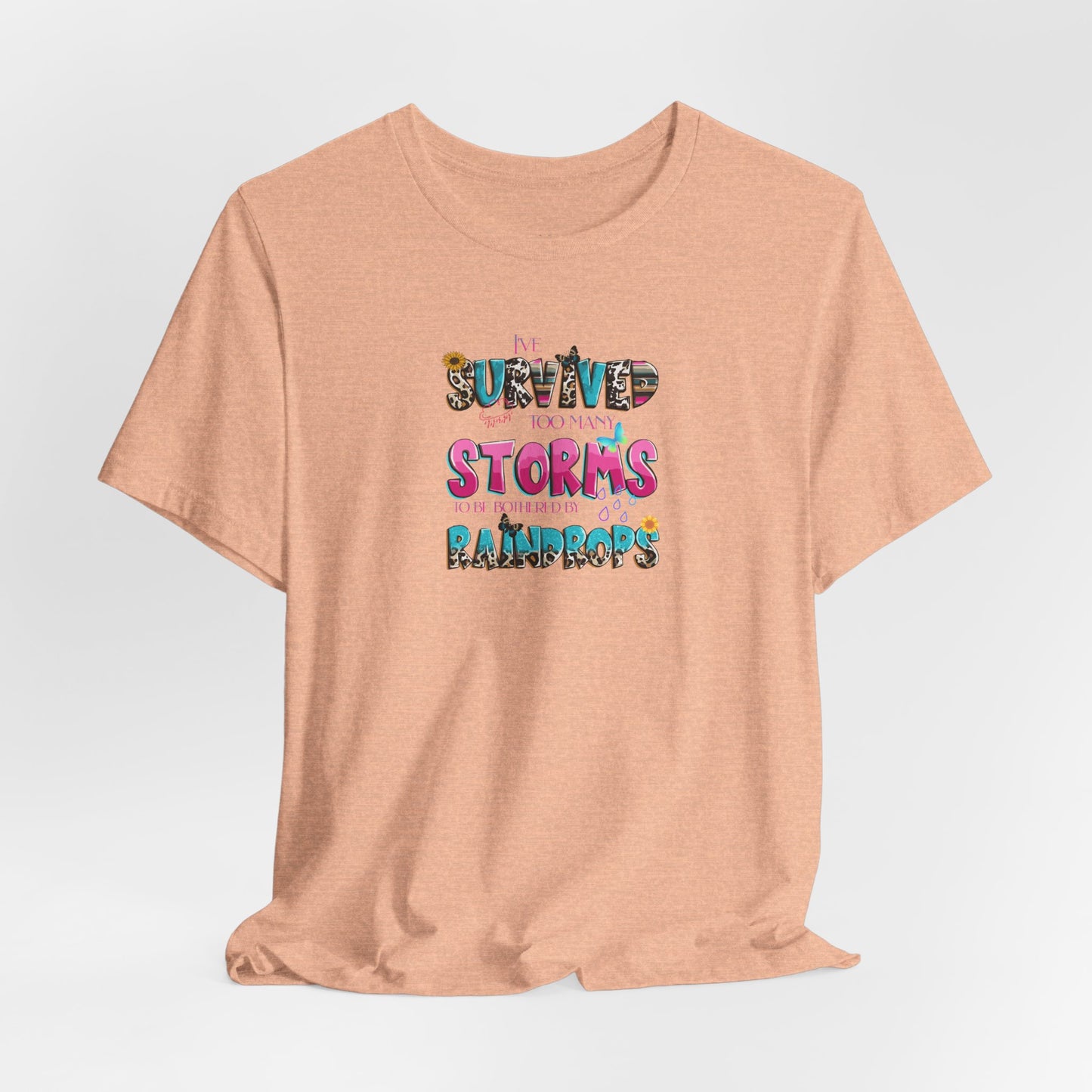 "I've Survived Too Many Storms to Be Bothered by Raindrops" Inspirational Graphic T‑Shirt