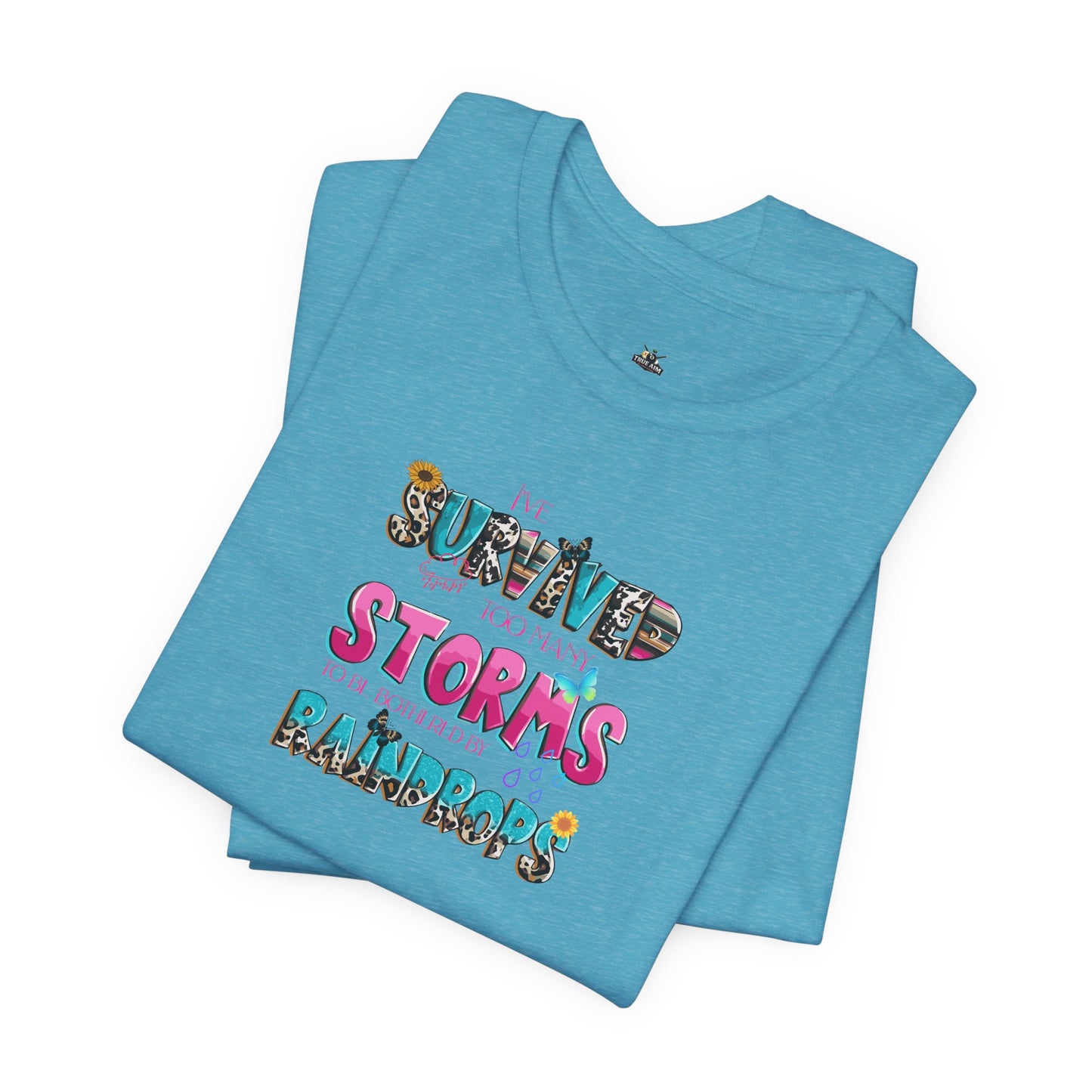 "I've Survived Too Many Storms to Be Bothered by Raindrops" Inspirational Graphic T‑Shirt