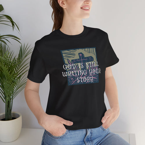 God Is Still Writing Your Story Tee — Inspirational Christian T‑Shirt